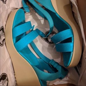 Turquoise Crocs wedges